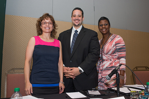 three people posing for a picture