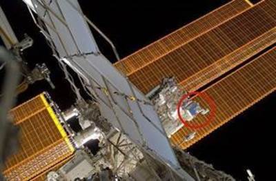 External image of the International Space Station showing SCAN Testbed installed on the nadir side
