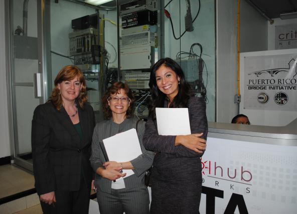 Critical Hub Networks Vice President Karen Larson, Deputy Asst. Secretary Anna Gómez, and Puerto Rico Bridge Initiative Community Outreach Coordinator Leslie Ortíz 