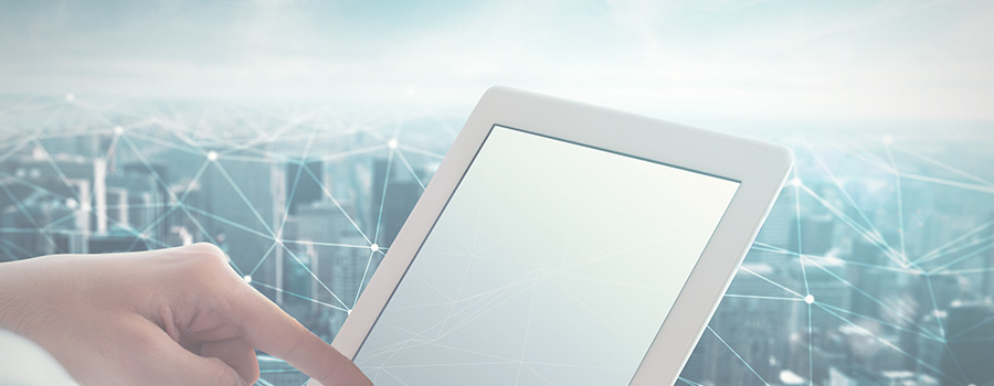 Man touches the tablet with a net of interconnection spheres connected each other. 