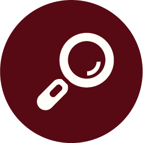 Magnifying glass icon on dark red circle