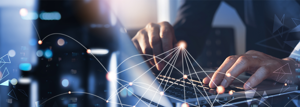 Businessman working on laptop and digital tablet with internet network